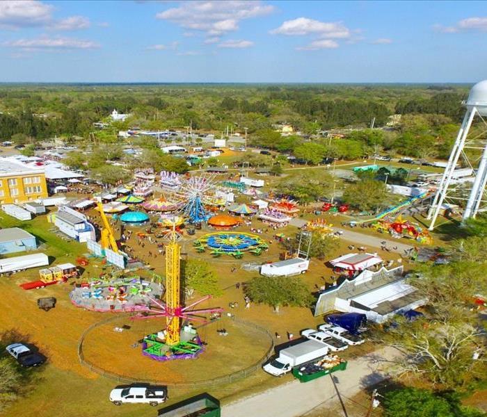 Ferris wheel and other rides at the Frog Leg Festival