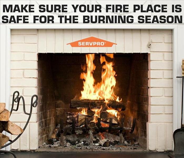 Stock image of fire place with SERVPRO logo