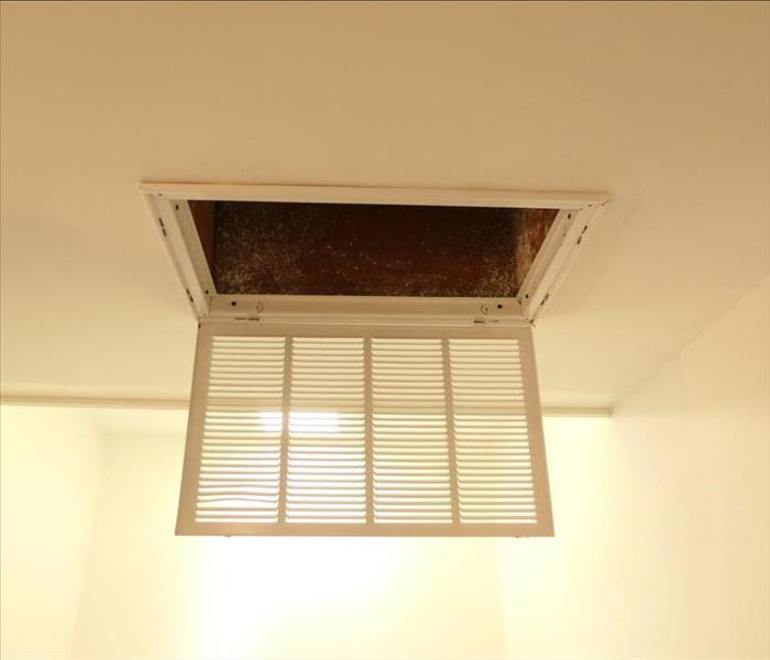 Return vent on ceiling in house opened up after duct cleaning 